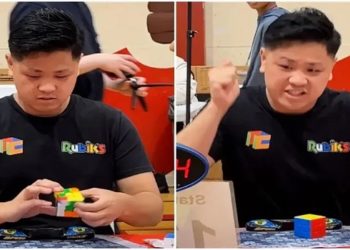 jOVEM AUTISTA CUBO MAGICO