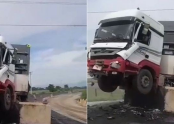 Carreta sobe em barreira de concreto e gera críticas à sinalização na RJ-238